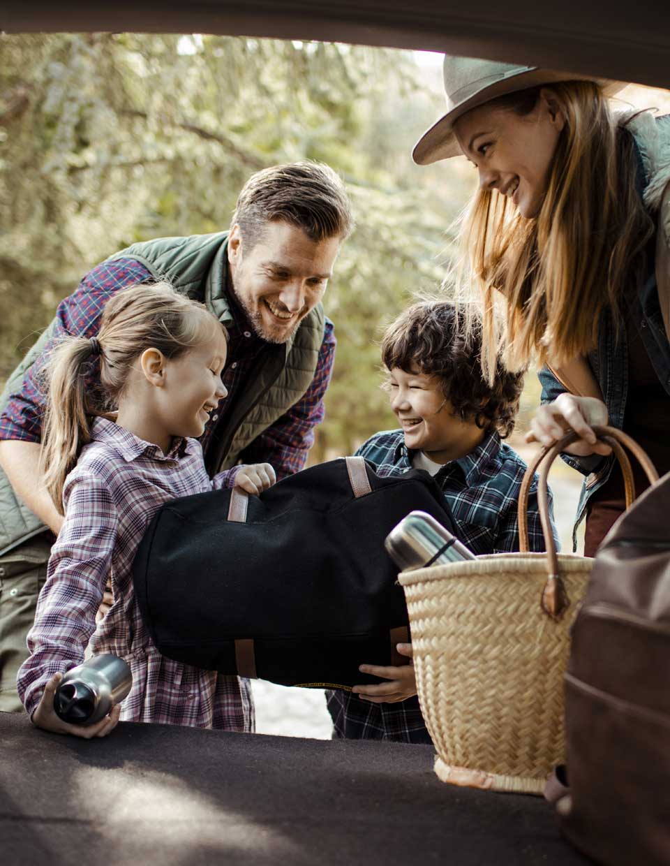 promo image for family preparing for a camping daytrip